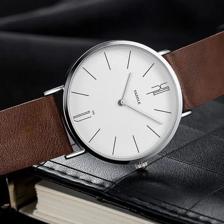 Sleek unisex watch showcasing a minimalist design and a premium leather strap. Ideal for a modern, sophisticated look.