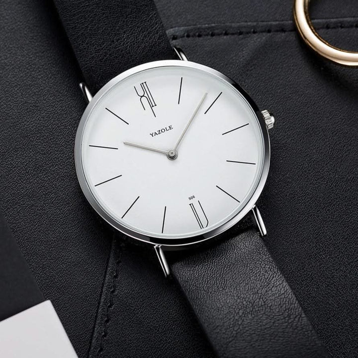 Versatile unisex minimalist watch with a durable leather band, suitable for both casual and formal occasions.