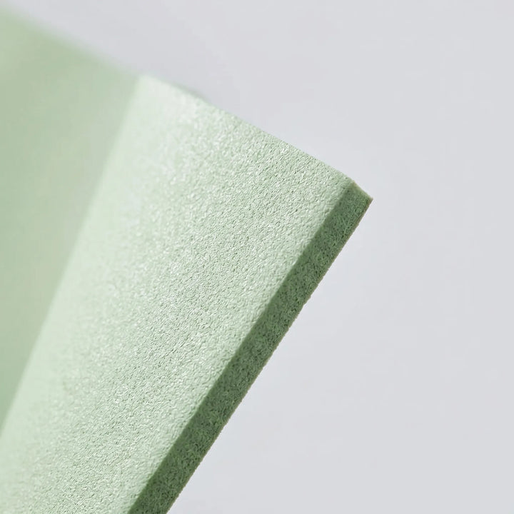 Guided alignment exercise mat for yoga & Pilates, mint green, offering precise positioning for all fitness levels.
