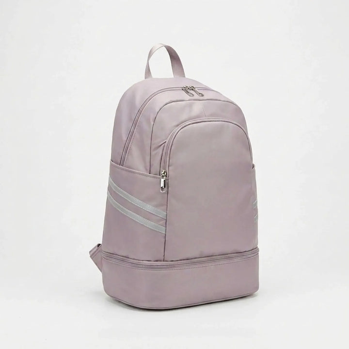 Modern unisex sports backpack with multiple pockets for organized daily essentials & laptop.