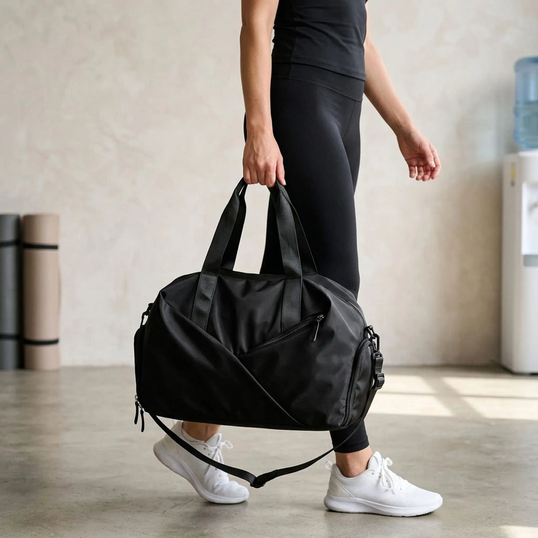 Unisex multifunctional gym duffel bag in black, perfect for workouts, sports, or travel. Durable athletic weekender.