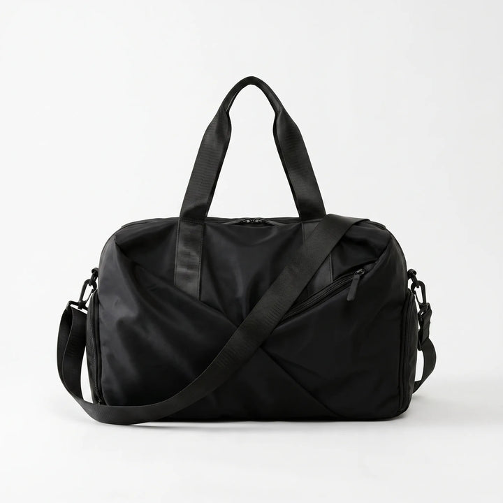 Spacious unisex gym duffel bag with multiple compartments for fitness gear, shoes, and travel essentials.