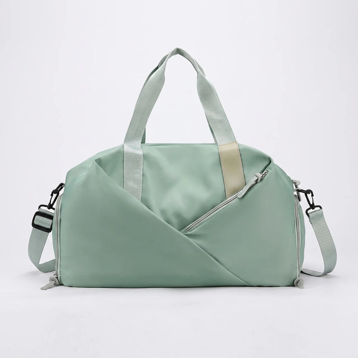 Close-up of durable, water-resistant fabric on a black multifunctional gym & travel duffel bag.