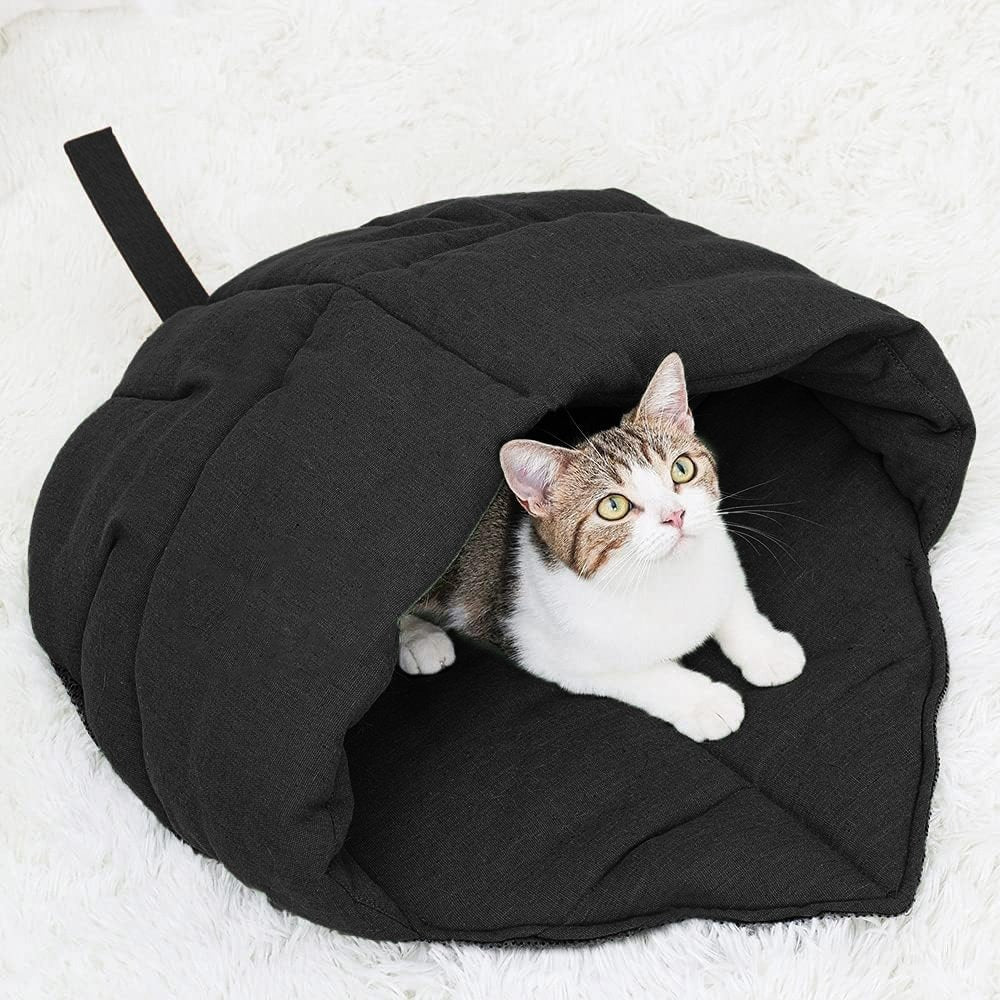 Cat cave in light natural linen, providing a private and secure sleeping spot for pets