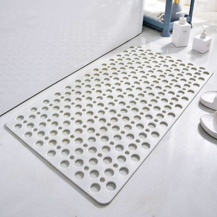 Strong grip non-slip shower mat with suction cups, essential for secure bathroom safety.
