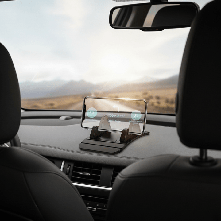 Silicone non-slip car phone holder. Universal dashboard mount for secure smartphone and gadget grip.
