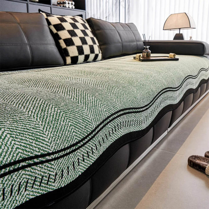 Wavy edge detail on a non-slip chenille sofa cover, showcasing its unique design and quality craftsmanship.