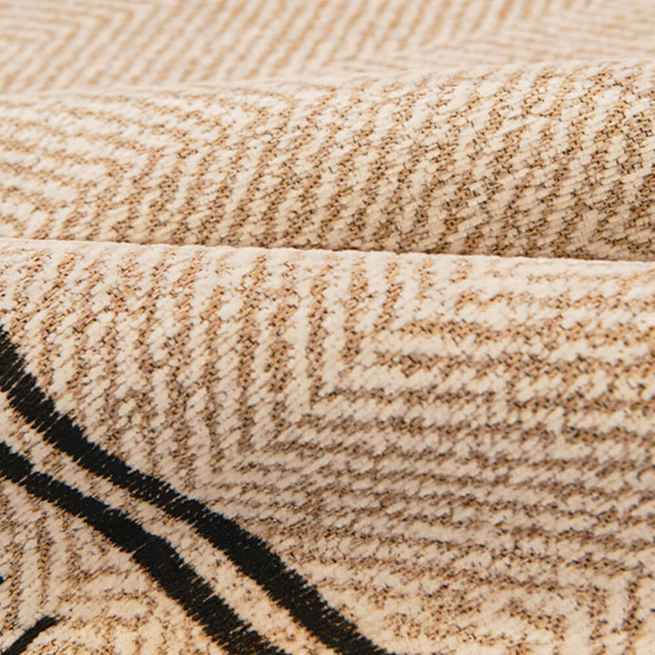 Unisex herringbone chenille couch cover in a modern interior, offering both style and furniture protection.