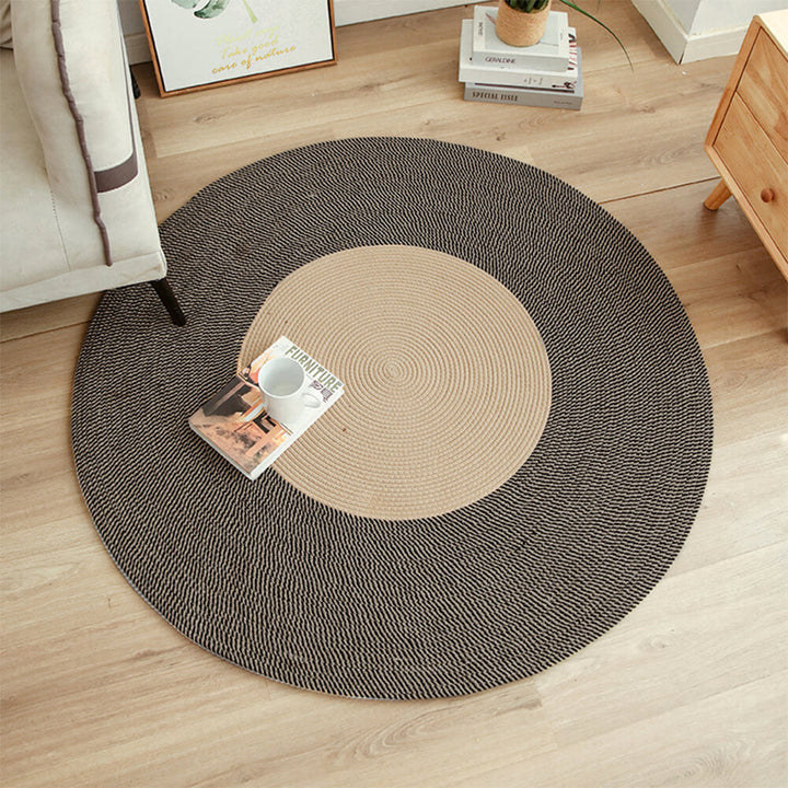 Modern Nordic cat scratch mat featuring handwoven cotton rope and fringe, a pet essential