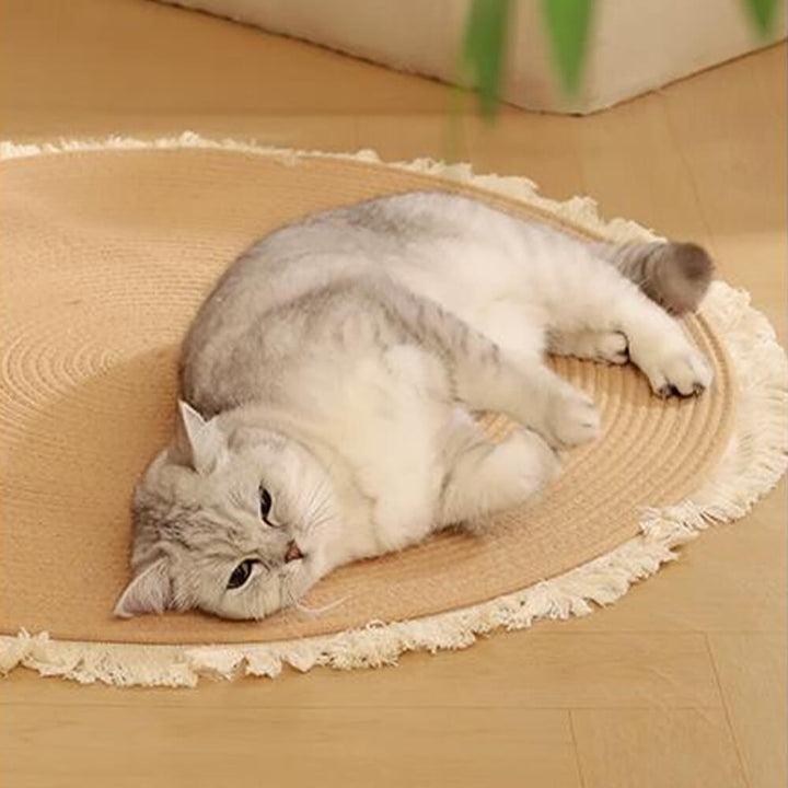 Close-up of handwoven Nordic cat scratcher with intricate cotton rope texture and fringes