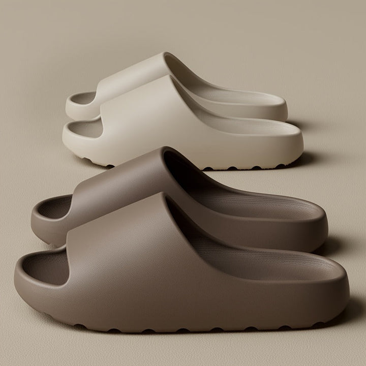 Unisex open-toe waterproof EVA comfort slippers. Ideal for beach, pool, or house wear. Lightweight & shock-absorbing.