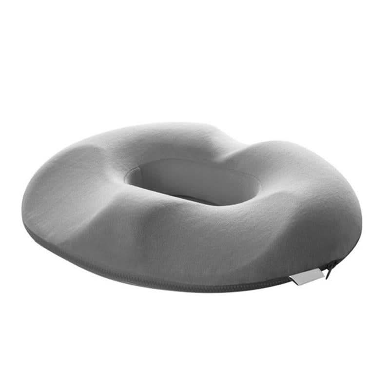 Posture-correcting orthopedic seat cushion with memory foam for coccyx & lower back pain relief.