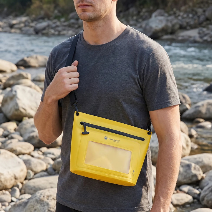 Durable unisex travel gear: a hands-free crossbody bag with a touchscreen window, great for phone use on the go.