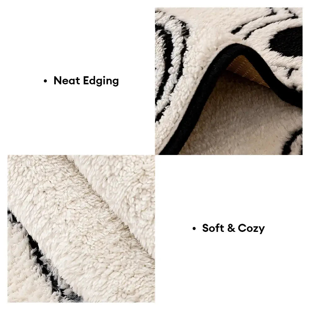 Detail of the soft texture and paw print design of the sofa protector