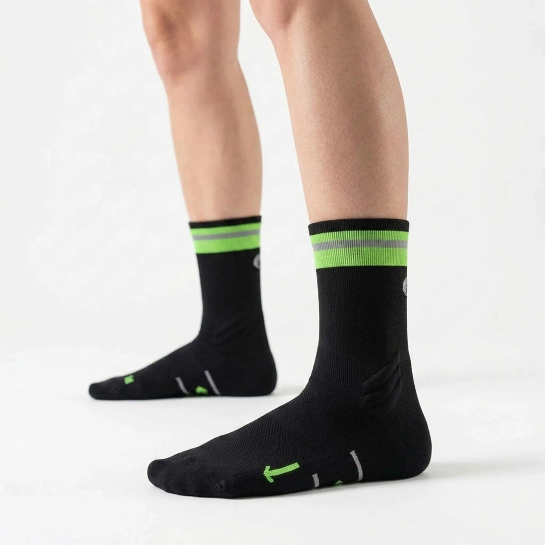 Activewear mid-calf compression socks with arch support for long-distance running, cycling, and intense workouts. Unisex design.