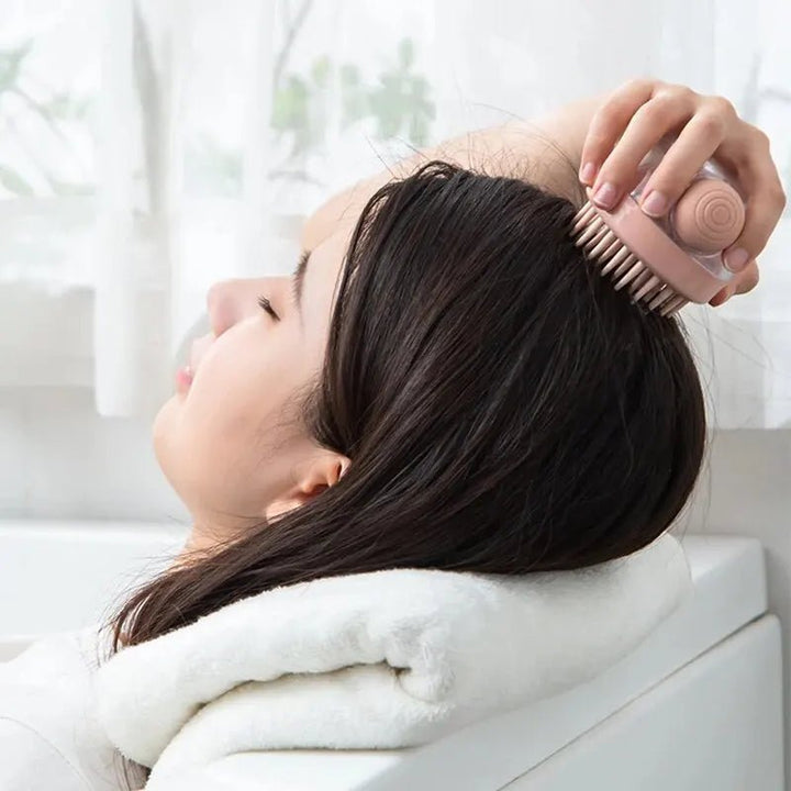 Dog bath and massage brush with built-in shampoo squirter, perfect for pet cleaning and care