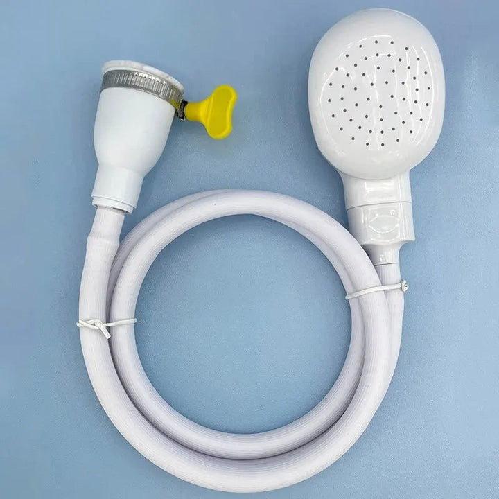 Close-up of pet grooming shower head with ergonomic design & flexible hose for bathing