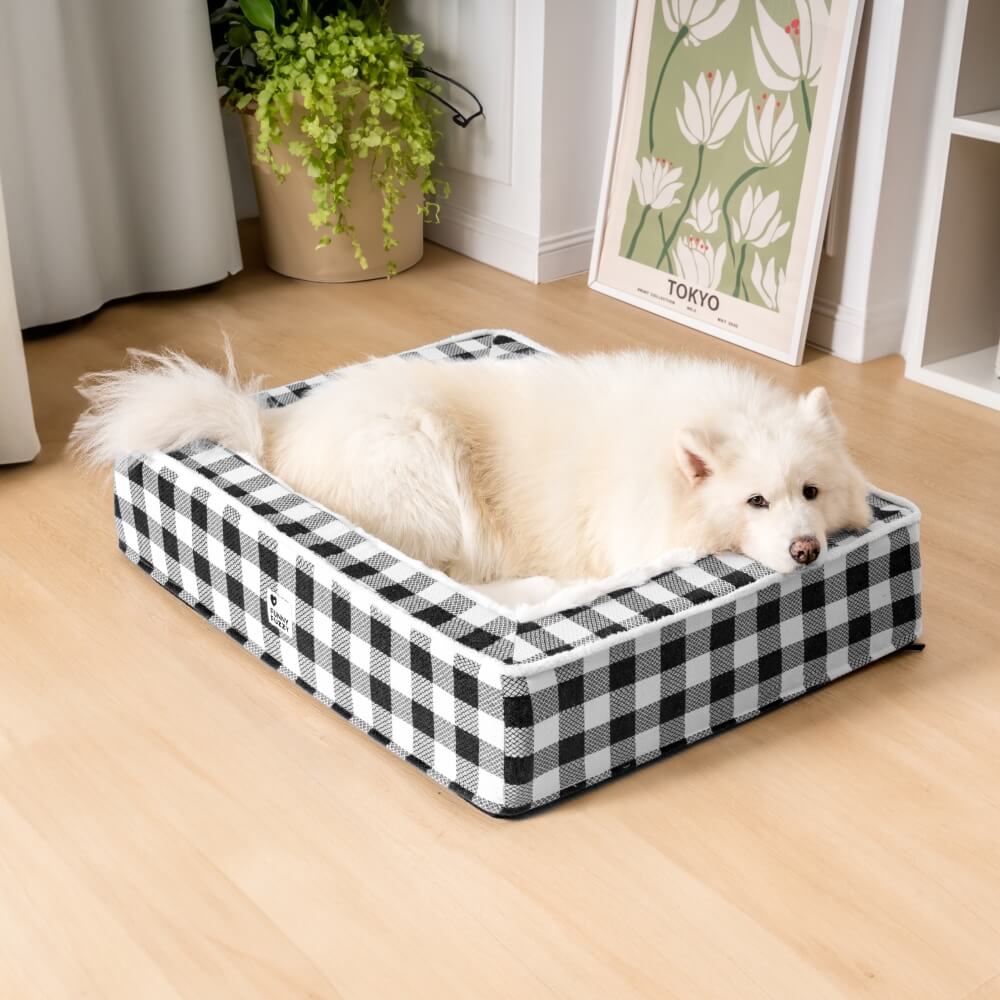 Unisex dog bed with traditional tartan print, offering anti-anxiety pet haven
