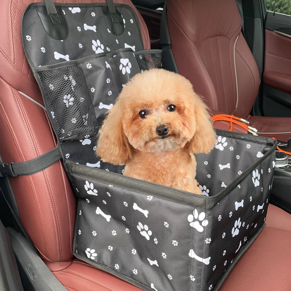 Dog car seat booster with side storage pockets for pet essentials, secure and comfortable travel gear.