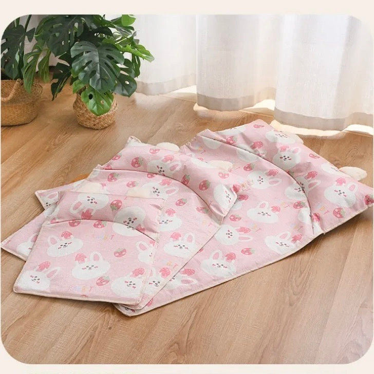 Two cats enjoying the large unisex pet cooling mat, a summer essential pet accessory
