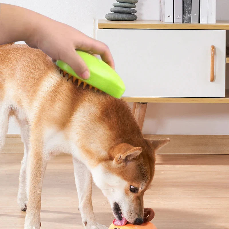 Hand holding a unisex pet deshedding brush, showing its comfortable grip for grooming