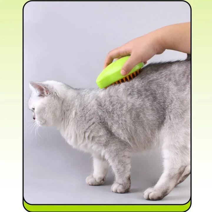 A cat enjoying a massage with the unisex pet deshedding brush, emphasizing comfort