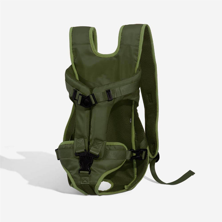 Breathable dog carrier backpack in action, being worn by a person on a hike.