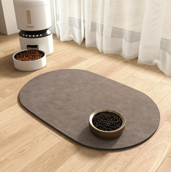 Grey silicone pet feeding mat with raised edges, prevents spills, for dog and cat food
