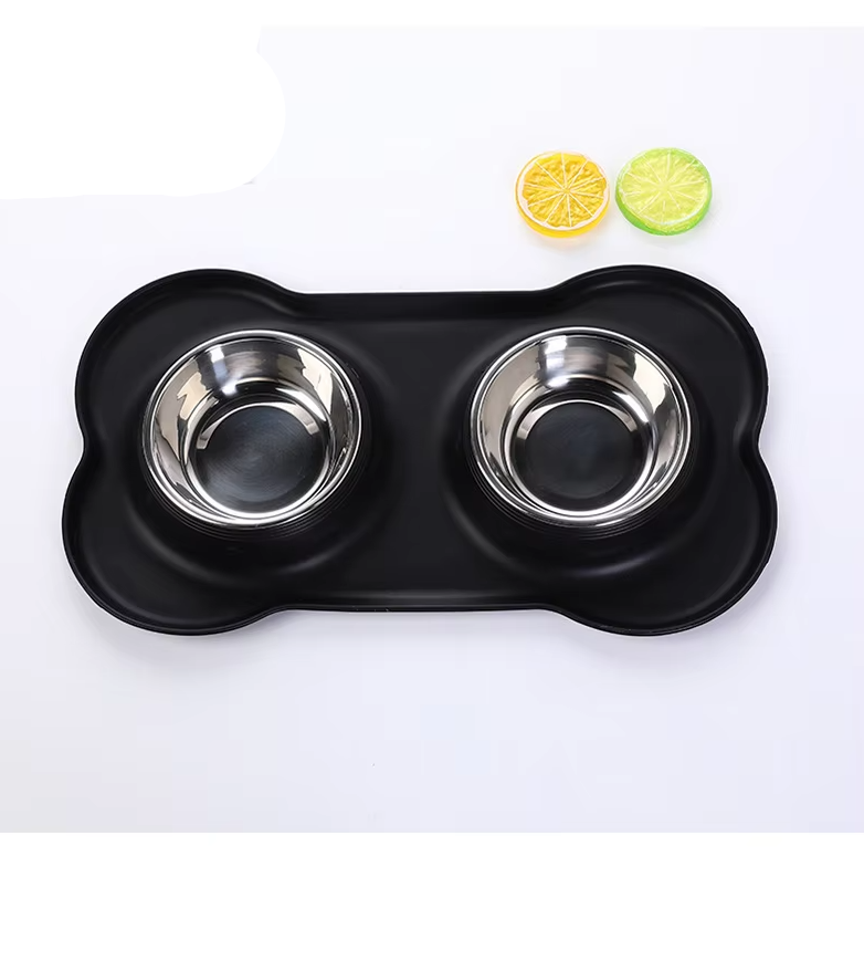 Durable stainless steel dog bowls nestled in a rectangular non-slip pet feeding mat, hygienic design