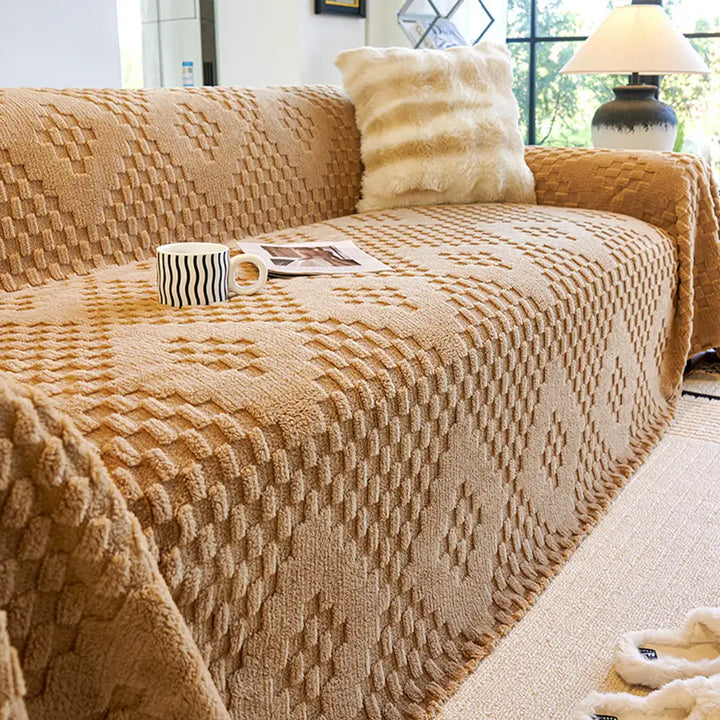 Close-up of the thickened jacquard velvet texture of a pet-friendly sofa cover, showing intricate pattern.