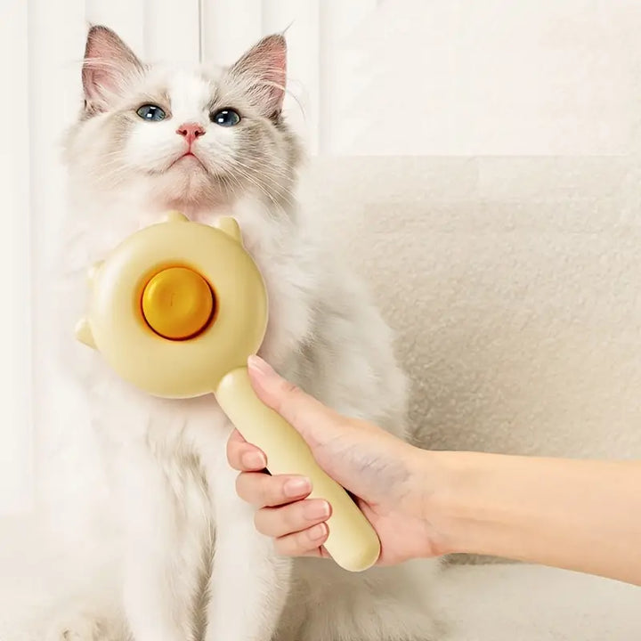 Unisex pet grooming brush for cats, effective for hair removal & daily shedding.
