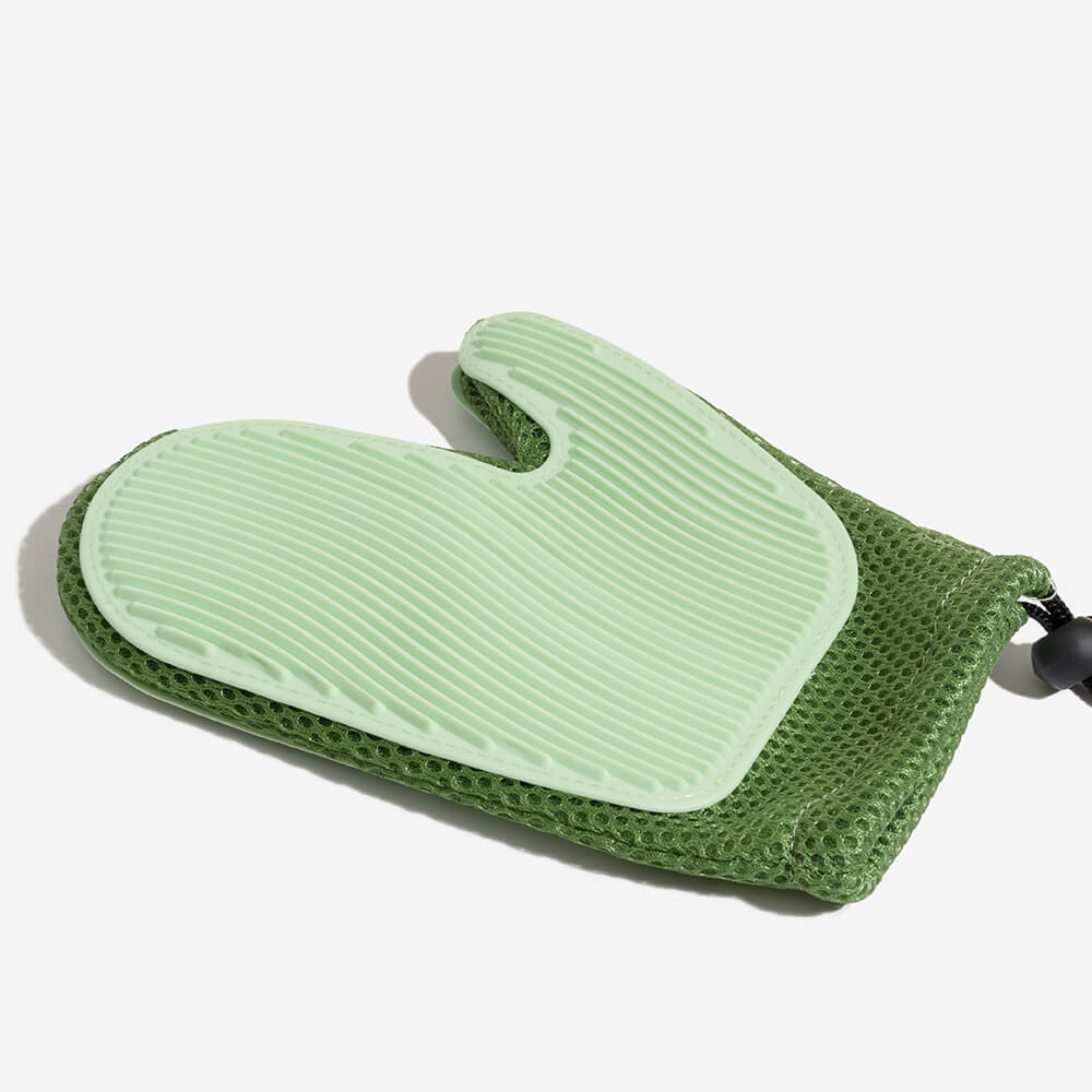 Unisex pet brush glove for gentle grooming, deshedding, and animal care.