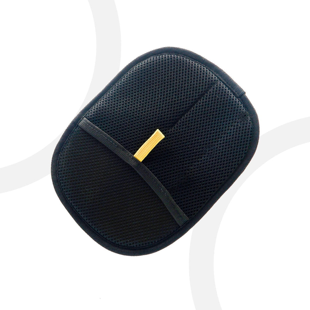 Close-up of pet grooming glove with soft rubber tips, ideal for dog grooming and cat deshedding