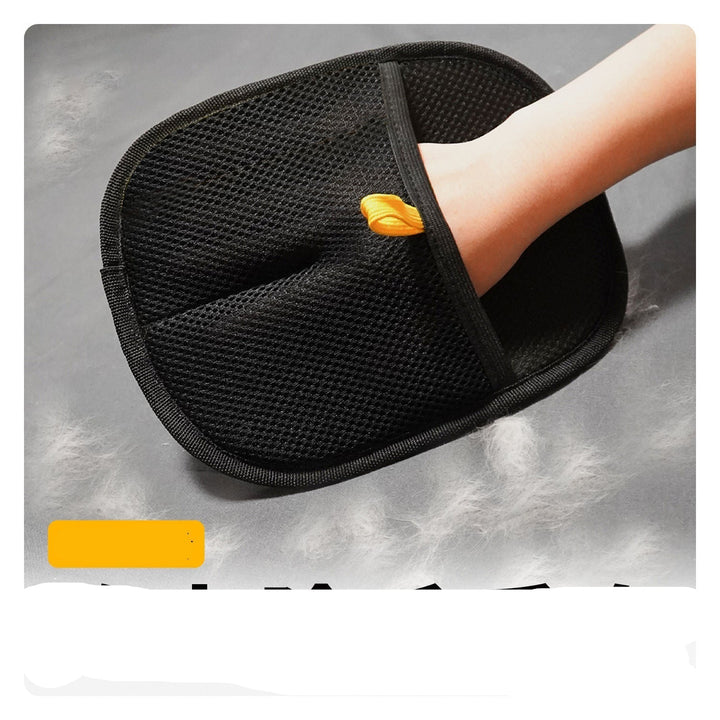 Pet grooming mitt with adjustable strap, suitable for all hand sizes for efficient pet hair removal