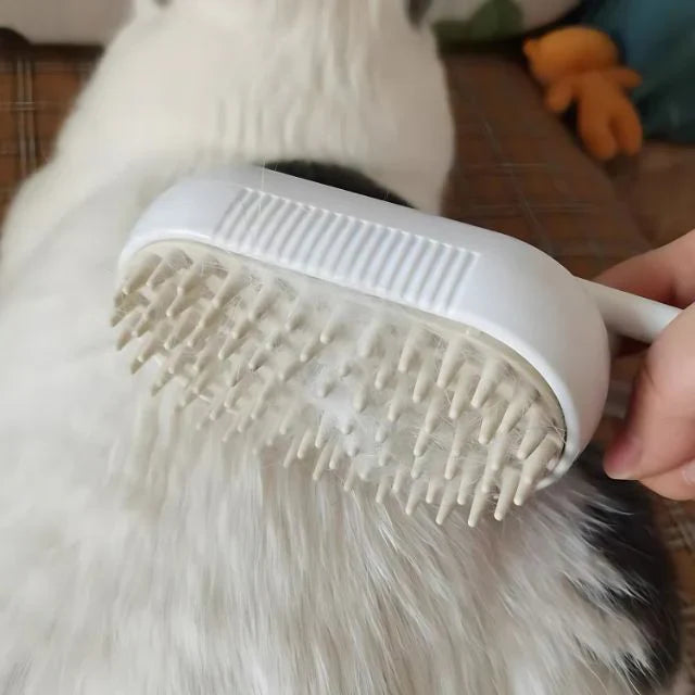 A full set of the unisex pet grooming steam brush, showcasing its compact design