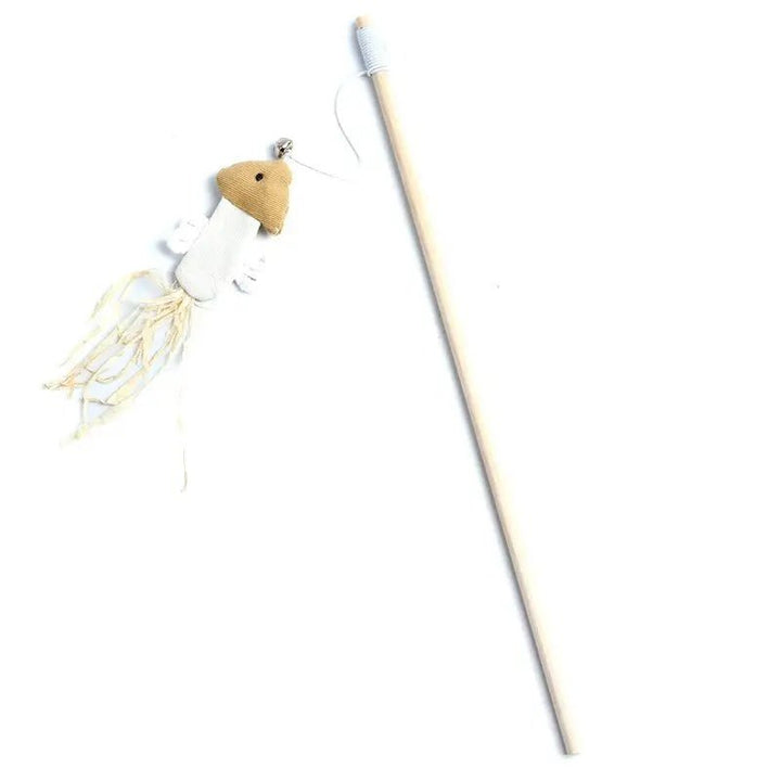 Cat pouncing on a soft feather teaser wand toy, illustrating active and healthy pet playtime