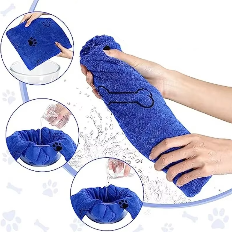 Dog being dried with a gray microfiber pet towel, showing quick dry action after swimming