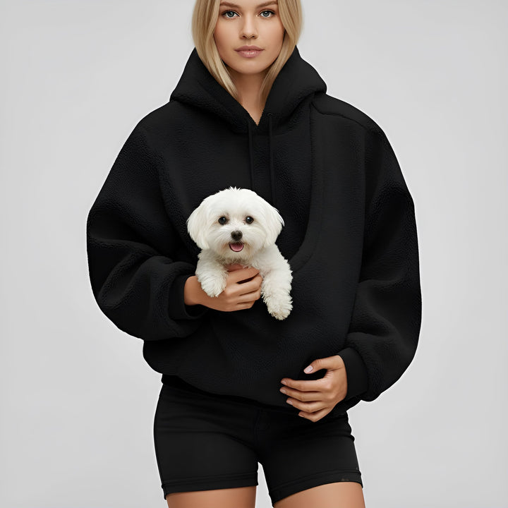 Close-up of the pet pouch on a unisex hooded sweatshirt, showing interior pet-friendly lining, essential pet accessory.