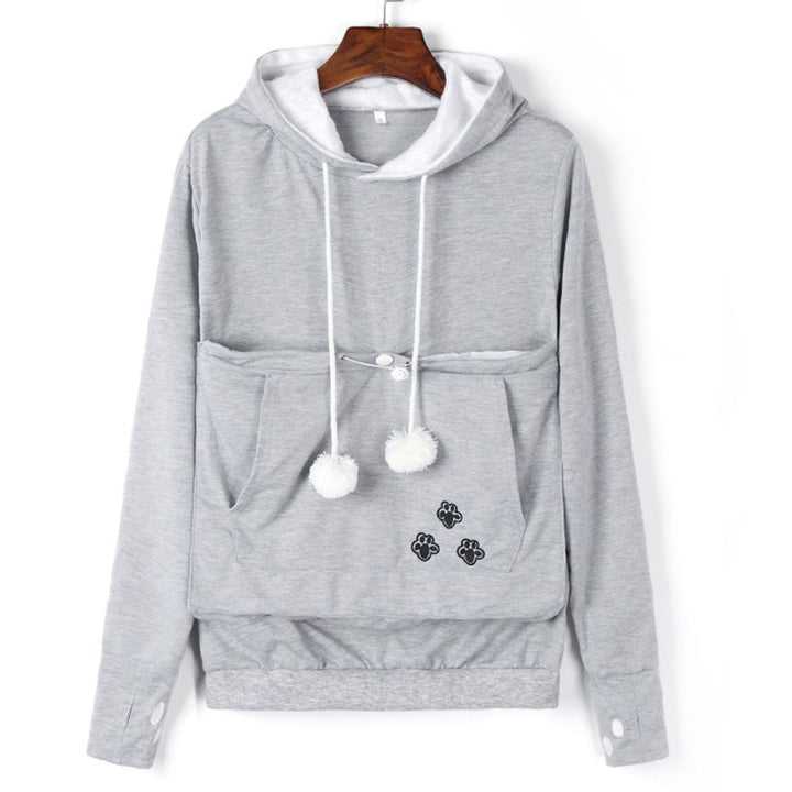 Back view of a person wearing a pet pouch hoodie, showcasing the comfortable pet carrier design.