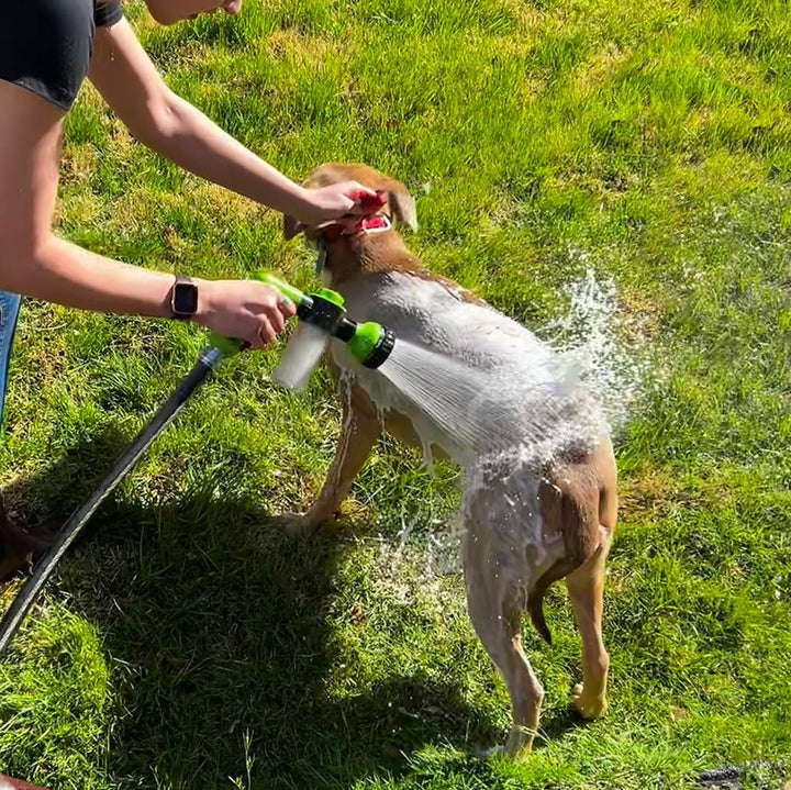 Pet grooming shower tool with soap dispenser, simplifying pet care and cleaning