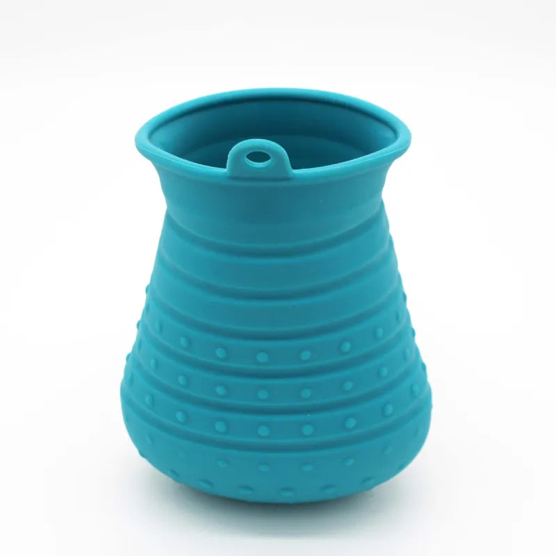 Ergonomic pet grooming tool with soft silicone bristles for gentle massage and shedding