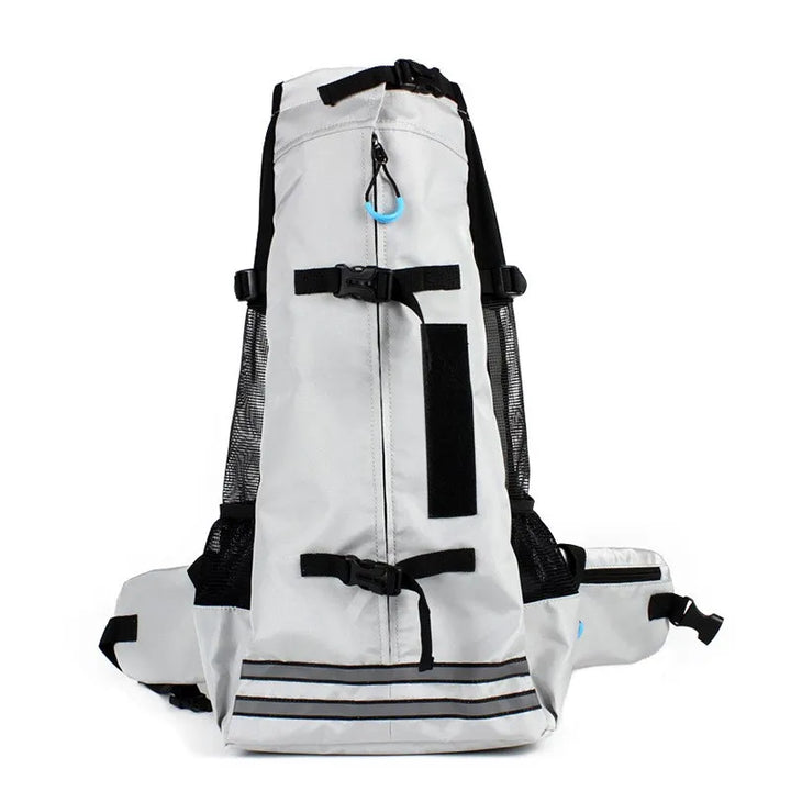 Side view of cat inside portable pet travel backpack, highlighting ample space for outdoor pet adventures