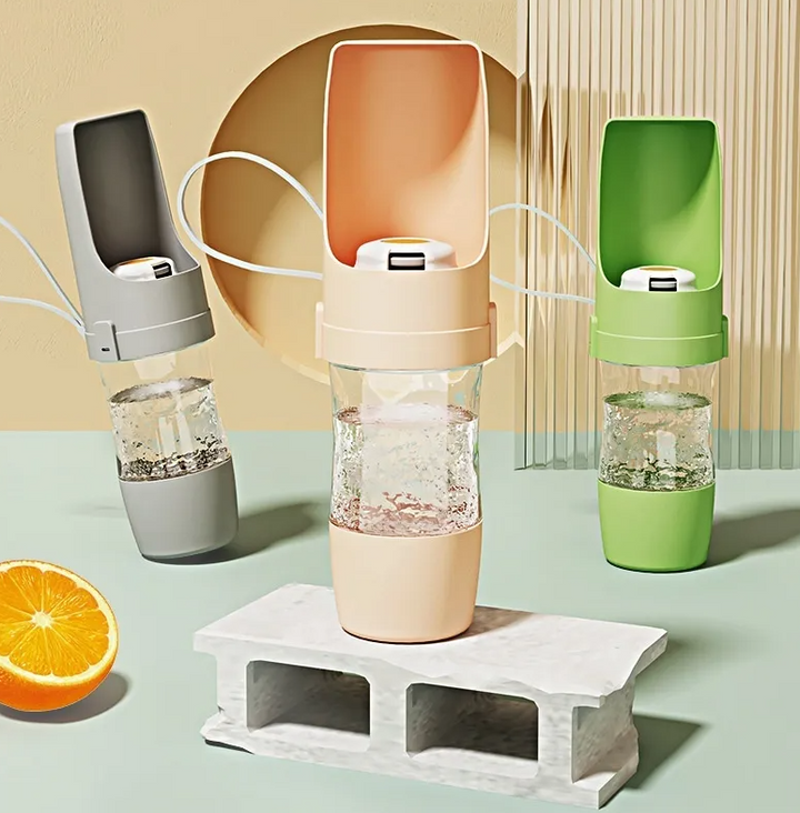 Unisex pet travel water bottle and food dispenser for dogs and cats