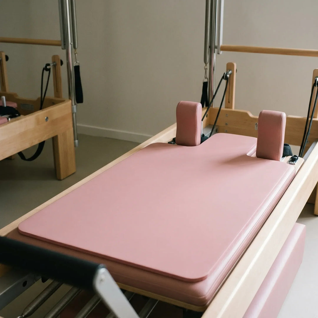 Unisex Pilates Reformer Pad for enhanced comfort & support during studio workouts. Non-slip fitness accessory.
