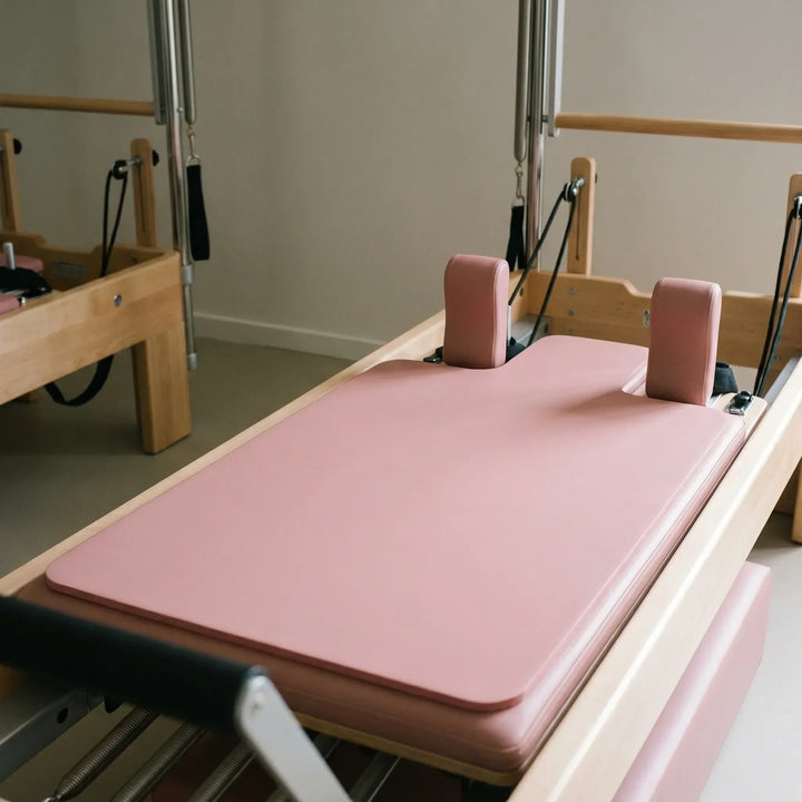 Unisex Pilates Reformer Pad for enhanced comfort & support during studio workouts. Non-slip fitness accessory.