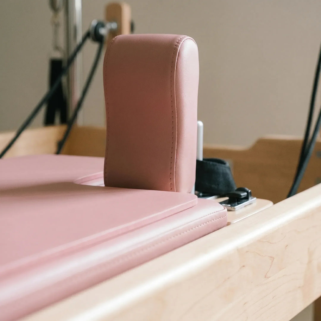 Premium Pilates Reformer Pad, non-slip mat for studio workouts. Boost comfort & support during exercises.