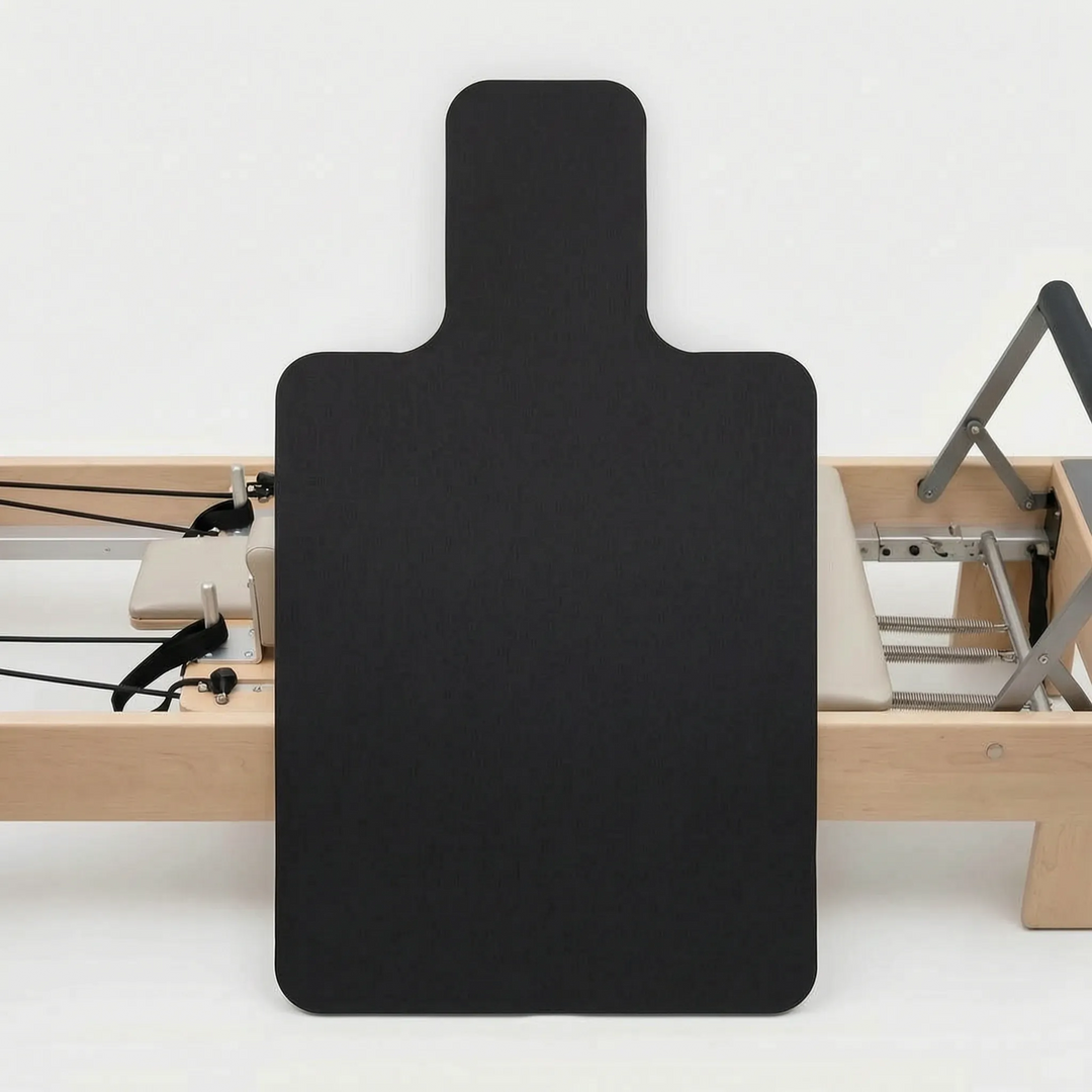 Non-slip Pilates Reformer Pad, essential for comfortable & hygienic studio workouts. Enhances exercise routine.