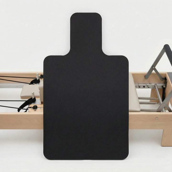 Non-slip Pilates Reformer Pad, essential for comfortable & hygienic studio workouts. Enhances exercise routine.