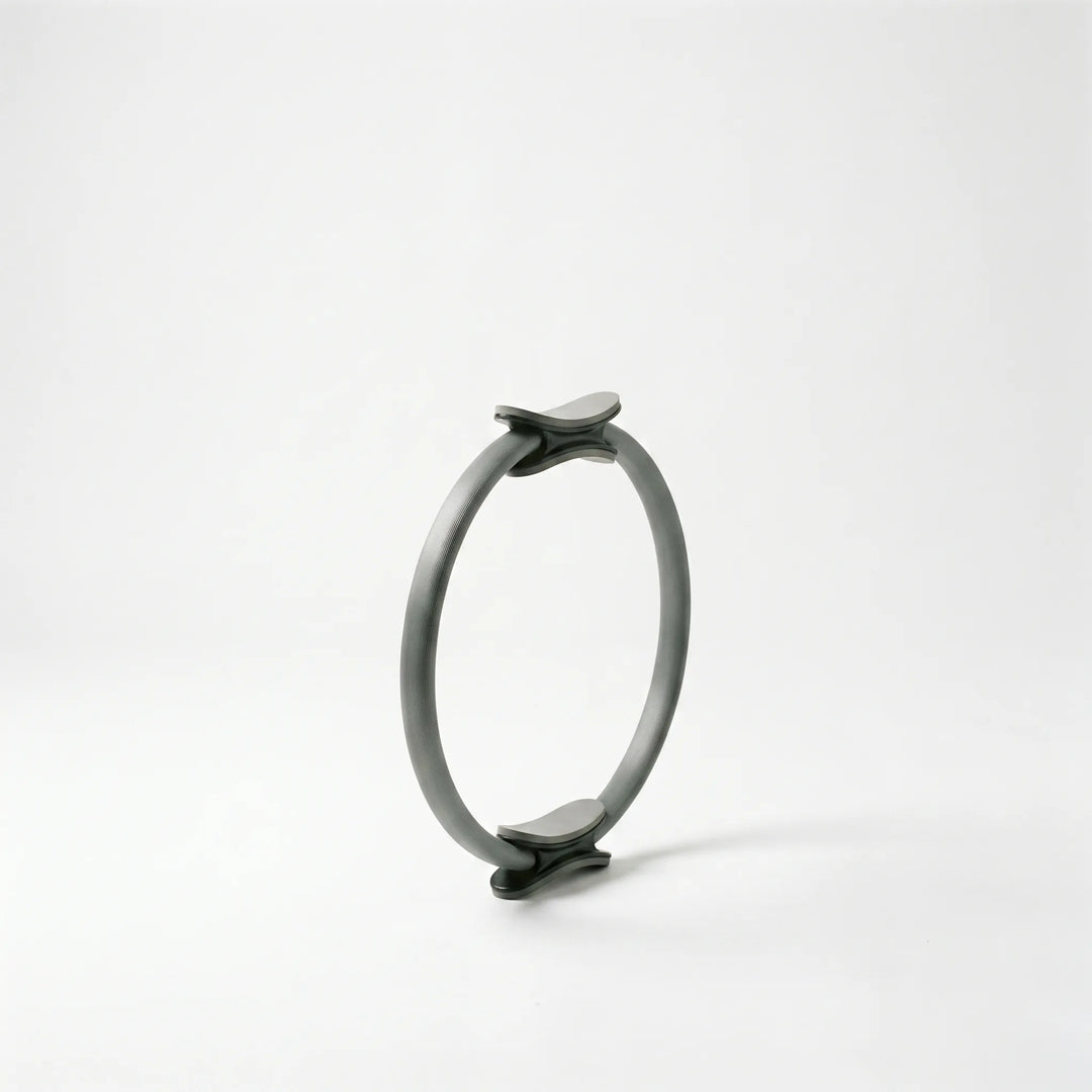 Pilates resistance ring for targeted thigh, arm, and core exercises. Enhance fitness, strength & flexibility at home.