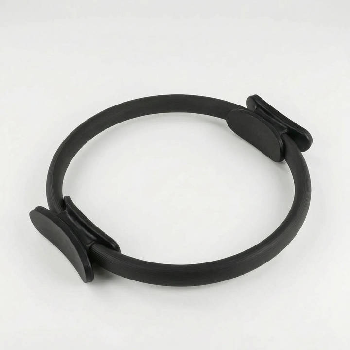 Versatile Pilates exercise ring for resistance workouts. Perfect for home gym training, core engagement & muscle strengthening.